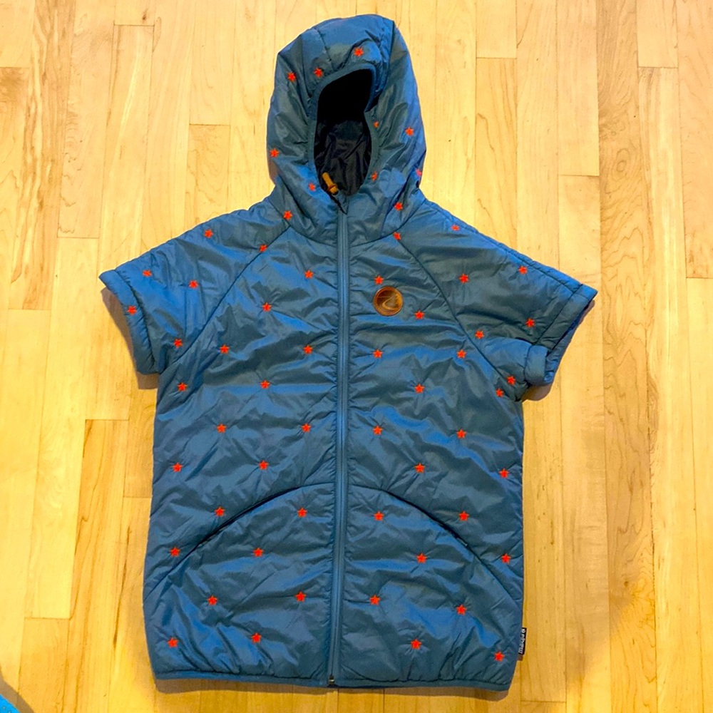Shortsleeve primaloft lightweight puffer with embroidered stars.
